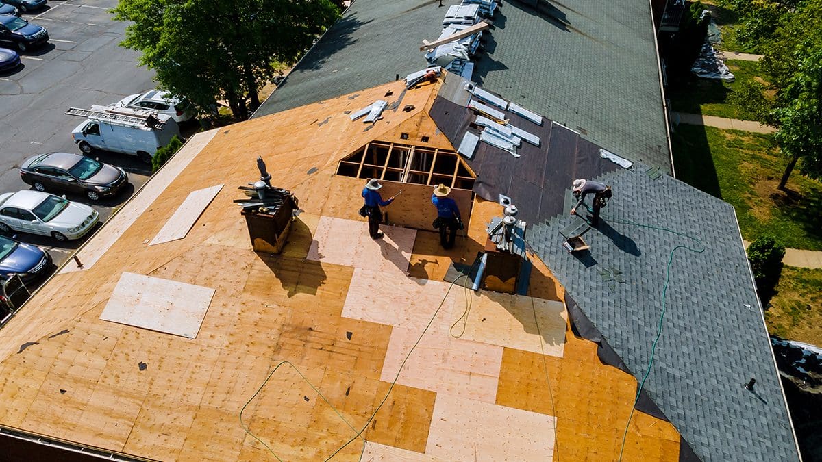 A bare roof in the process of having roofing installed, viewed from above.