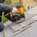 a person installing a new roof