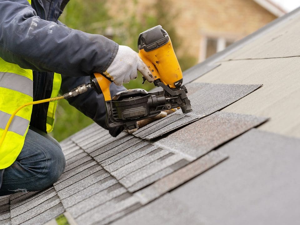 a person installing a new roof