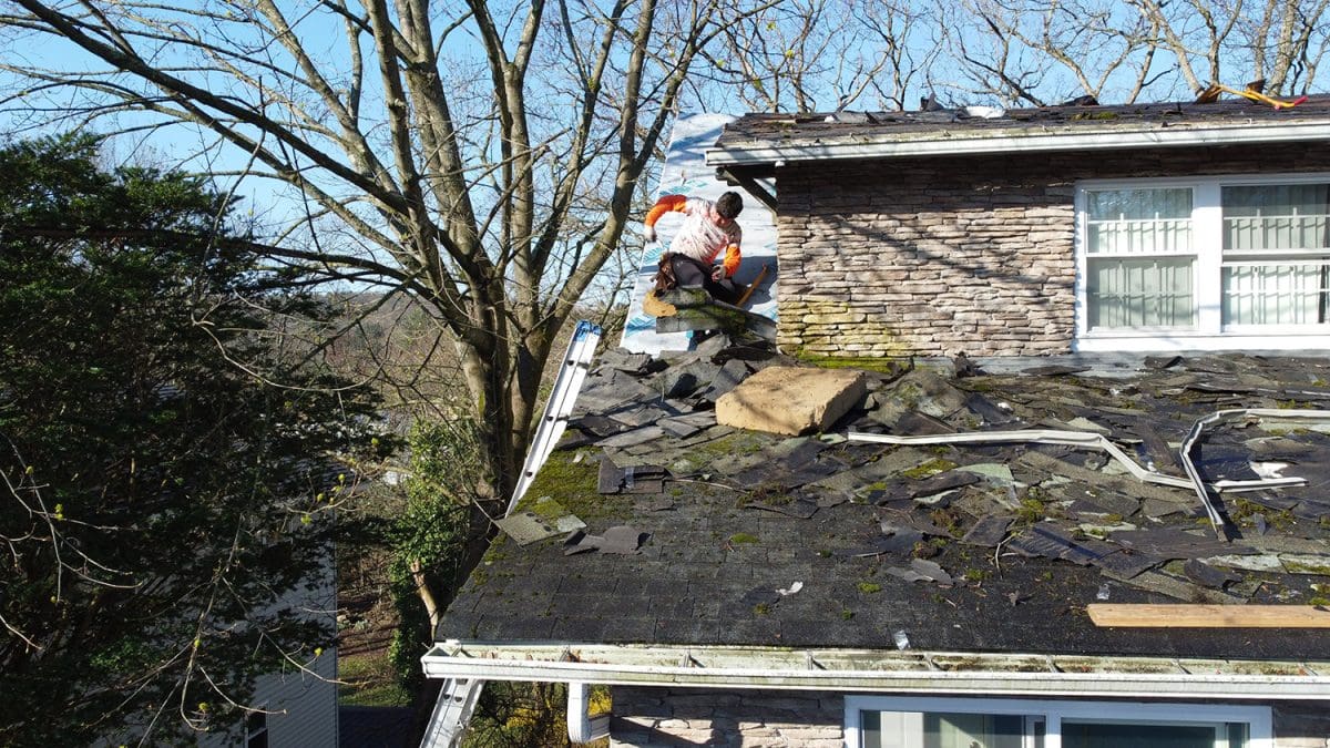 A photo of a roofing job in action.