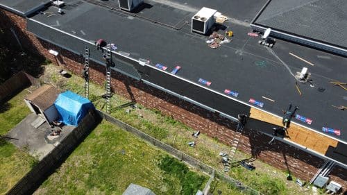 An overhead shot of a roof on a commercial building.